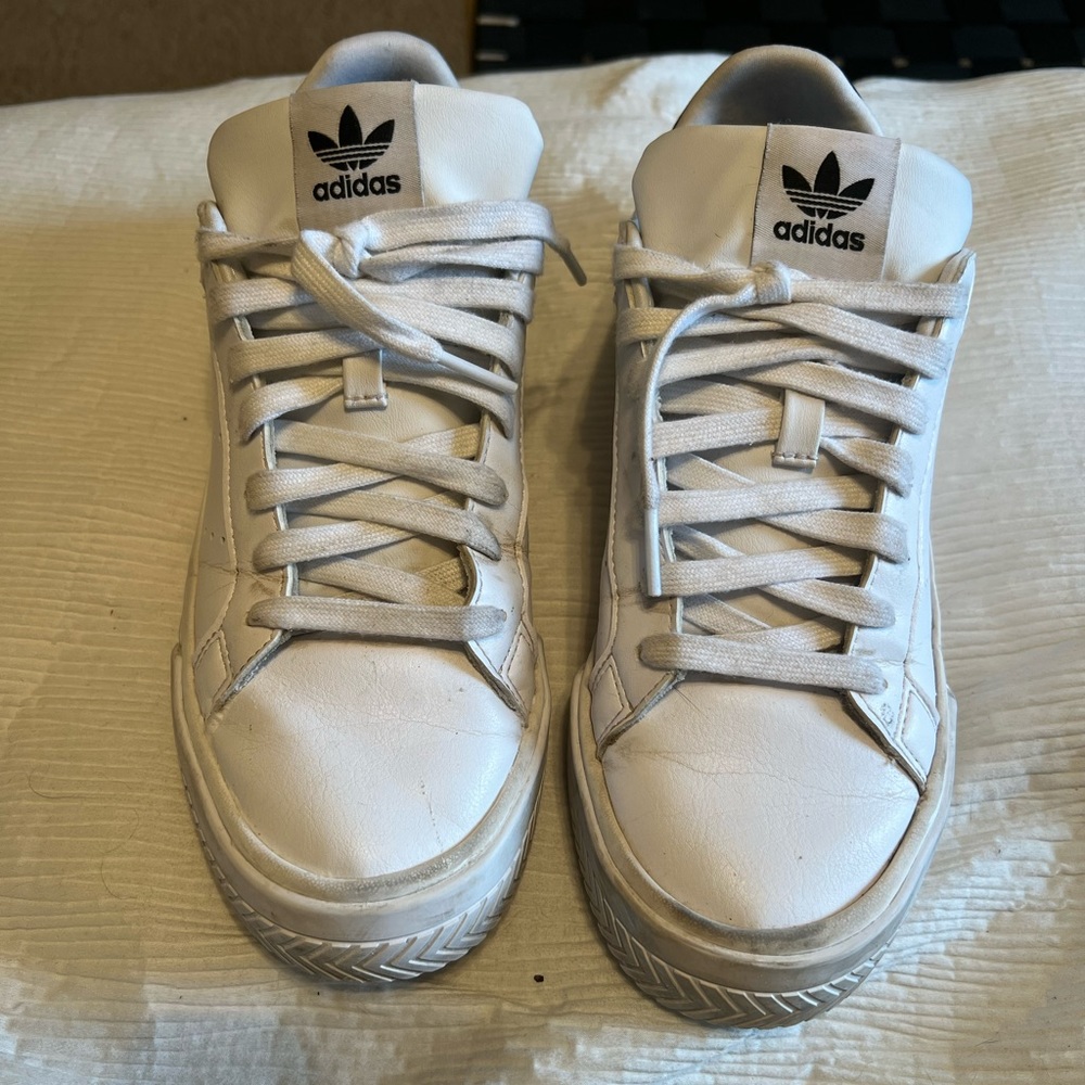 Women’s white adidas sneakers
